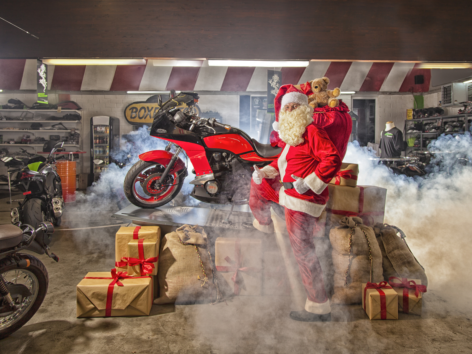 santa with motorcycle and christmas gifts