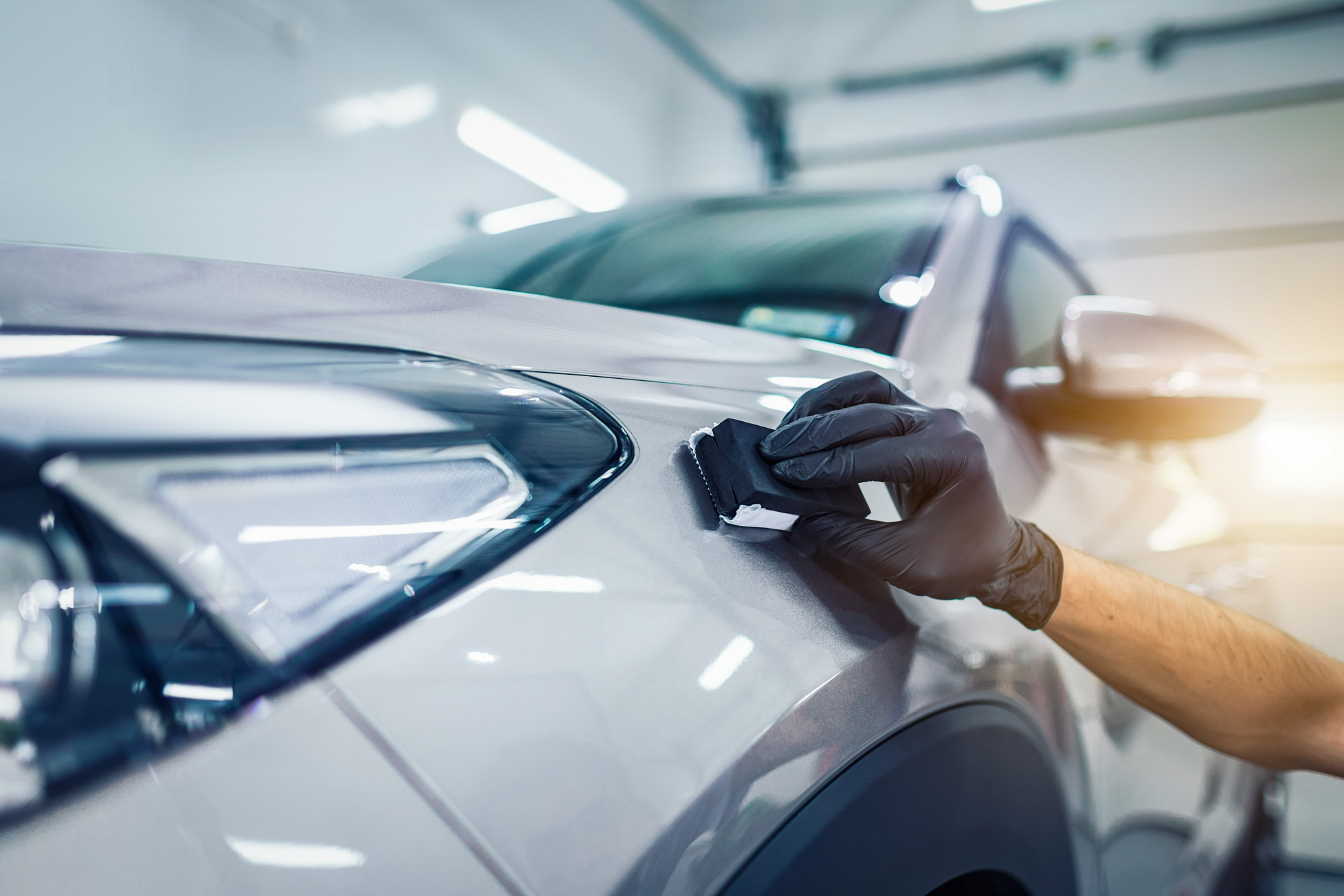 repair man working on car