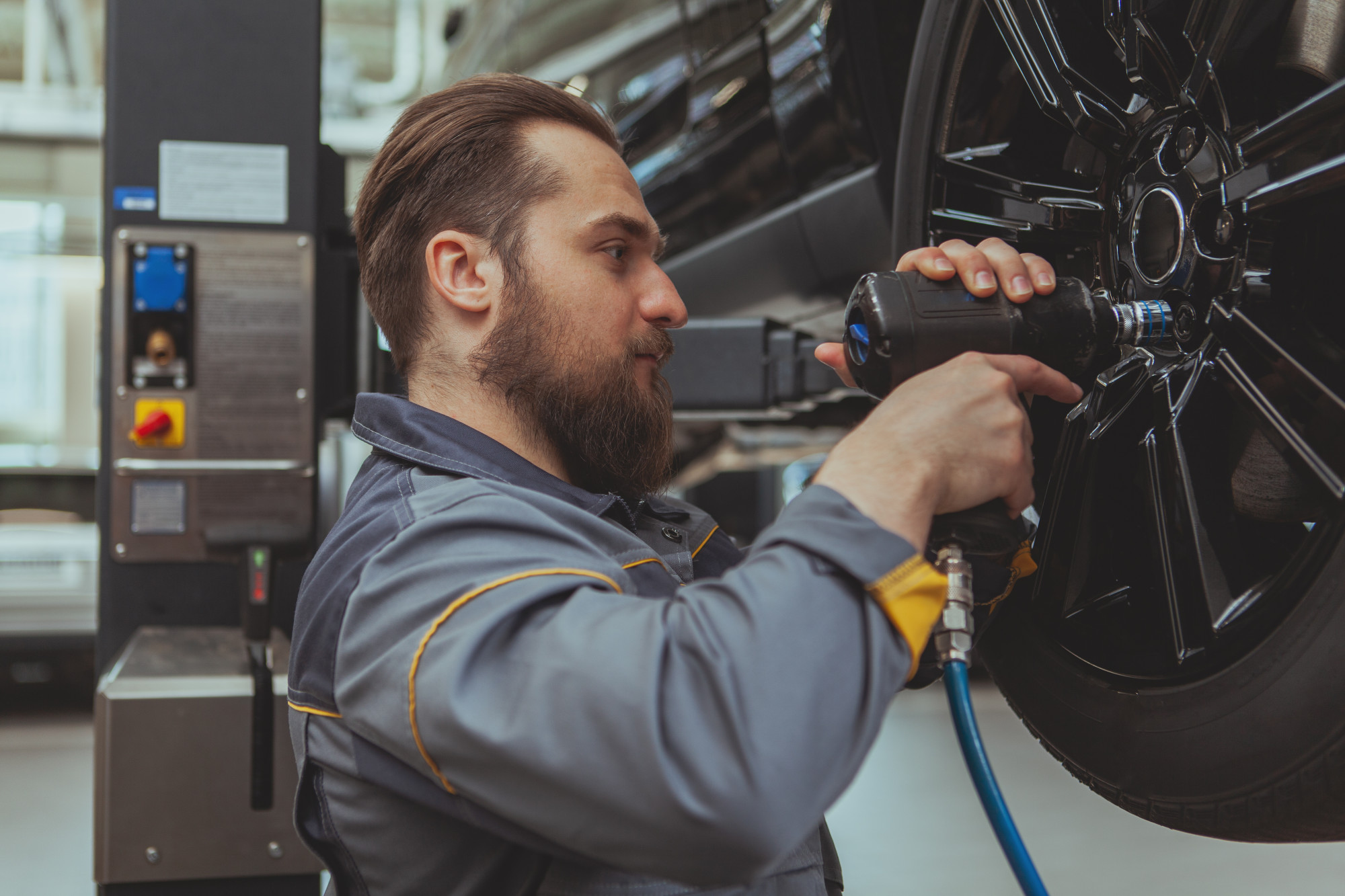 man putting on wheel