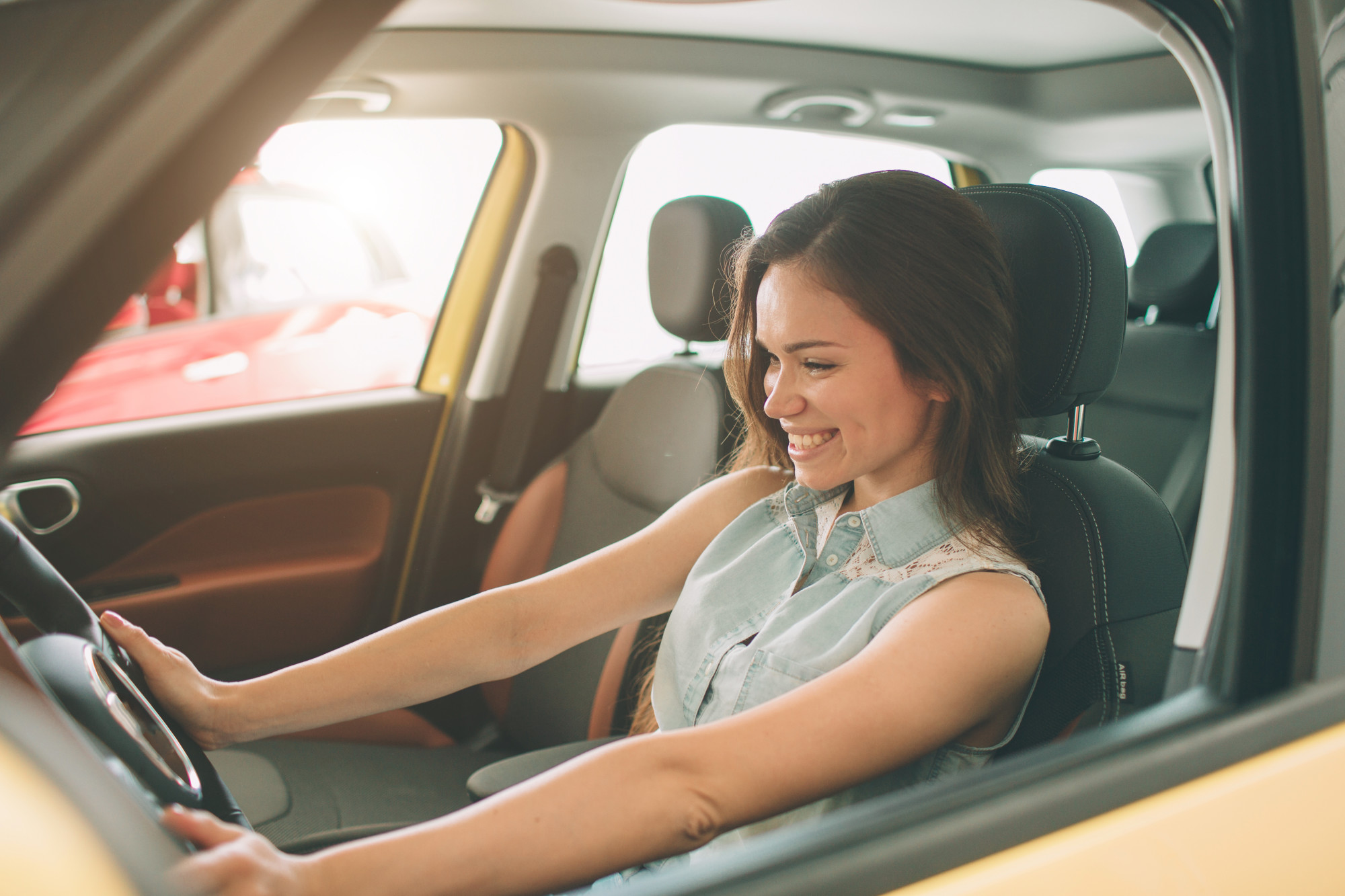 Woman Driving A New Car