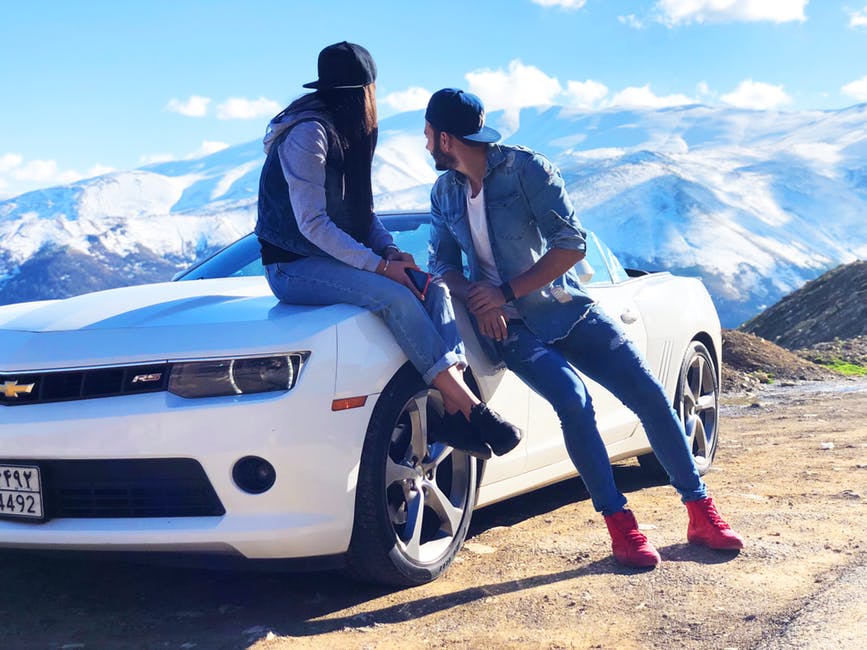 Couple on the Exterior of a 2020 Chevy Camaro