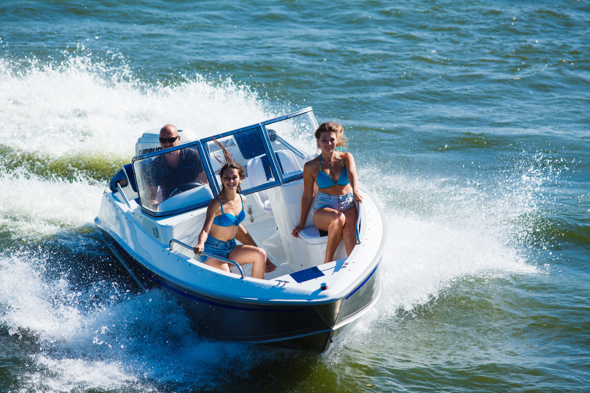 People on a Speedboat